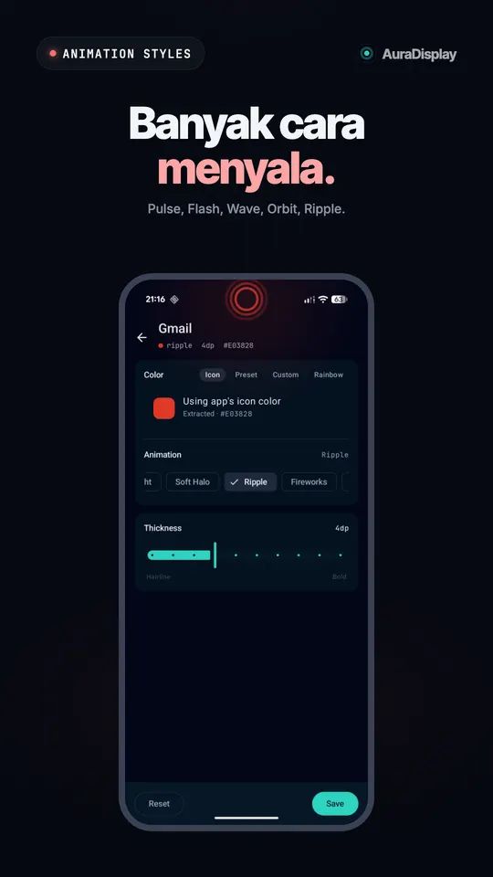 Pengaturan Gmail memakai warna merah dari ikonnya, dengan cincin merah beriak di sekitar kamera