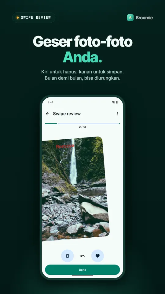 Pilah foto dengan geser, foto air terjun digeser ke kiri untuk dihapus, dengan tombol batalkan dan simpan
